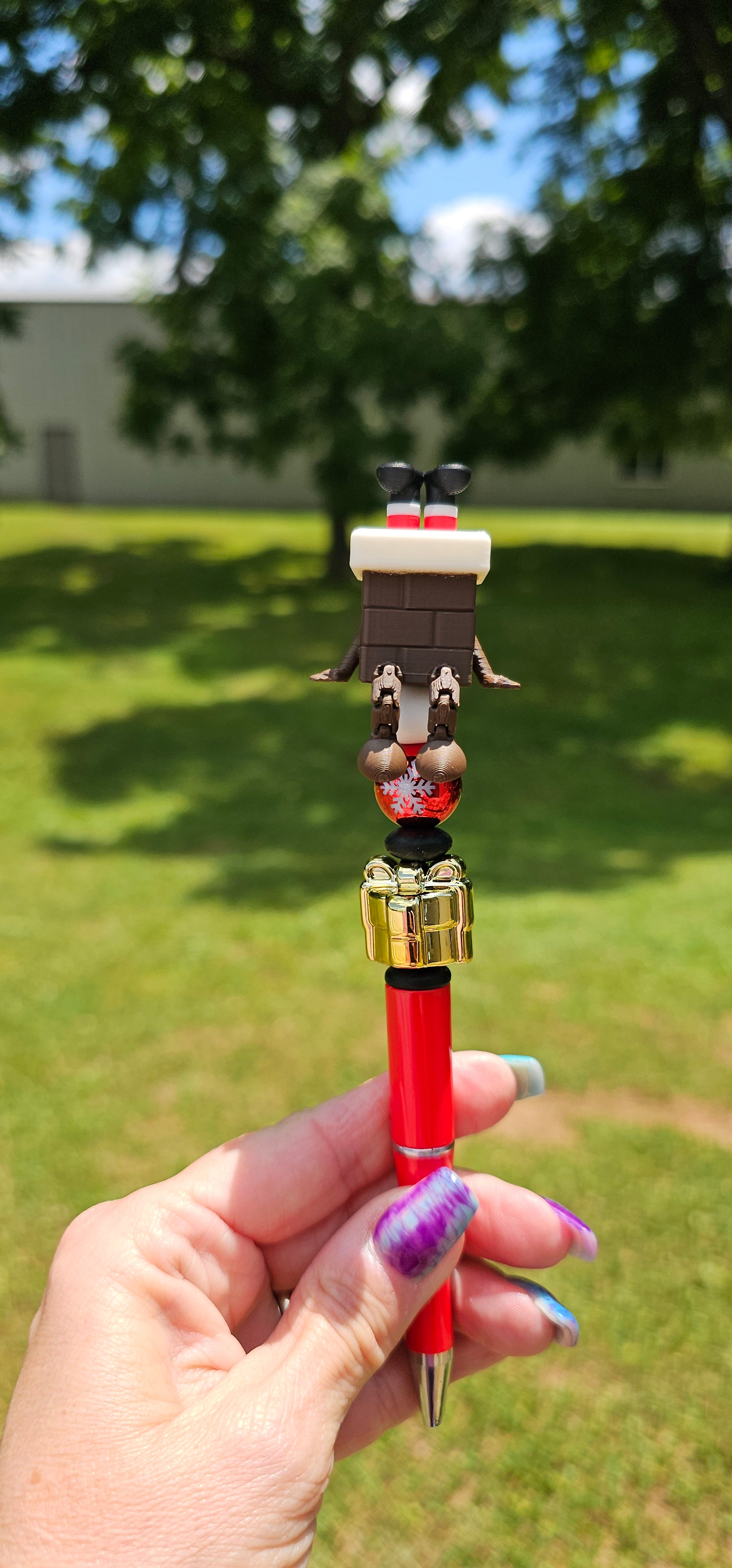 Stuck Up Santa Pen Topper *not silicone* printed by a 3D printer