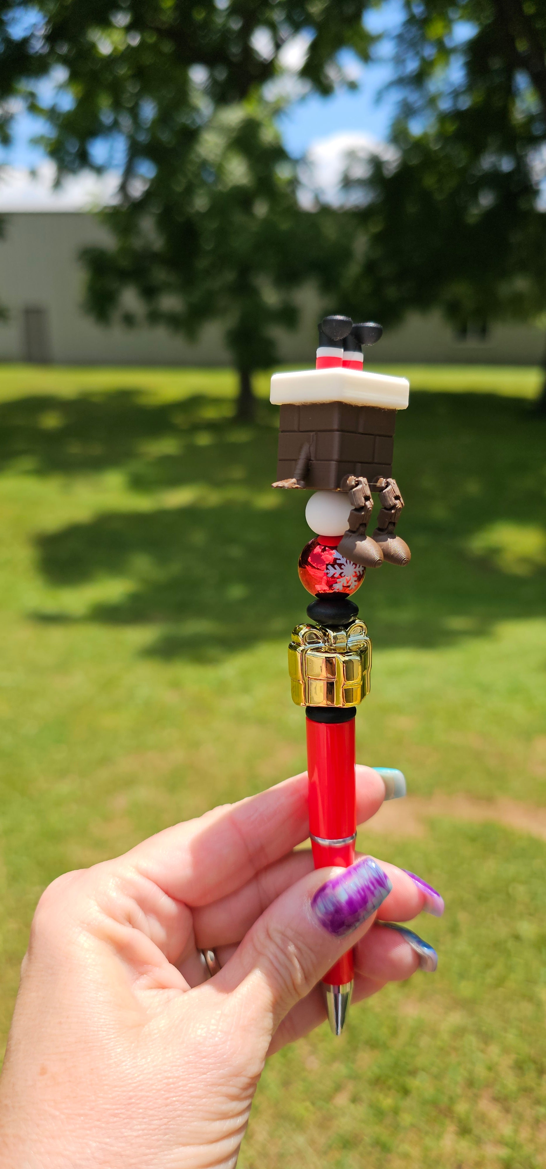 Stuck Up Santa Pen Topper *not silicone* printed by a 3D printer