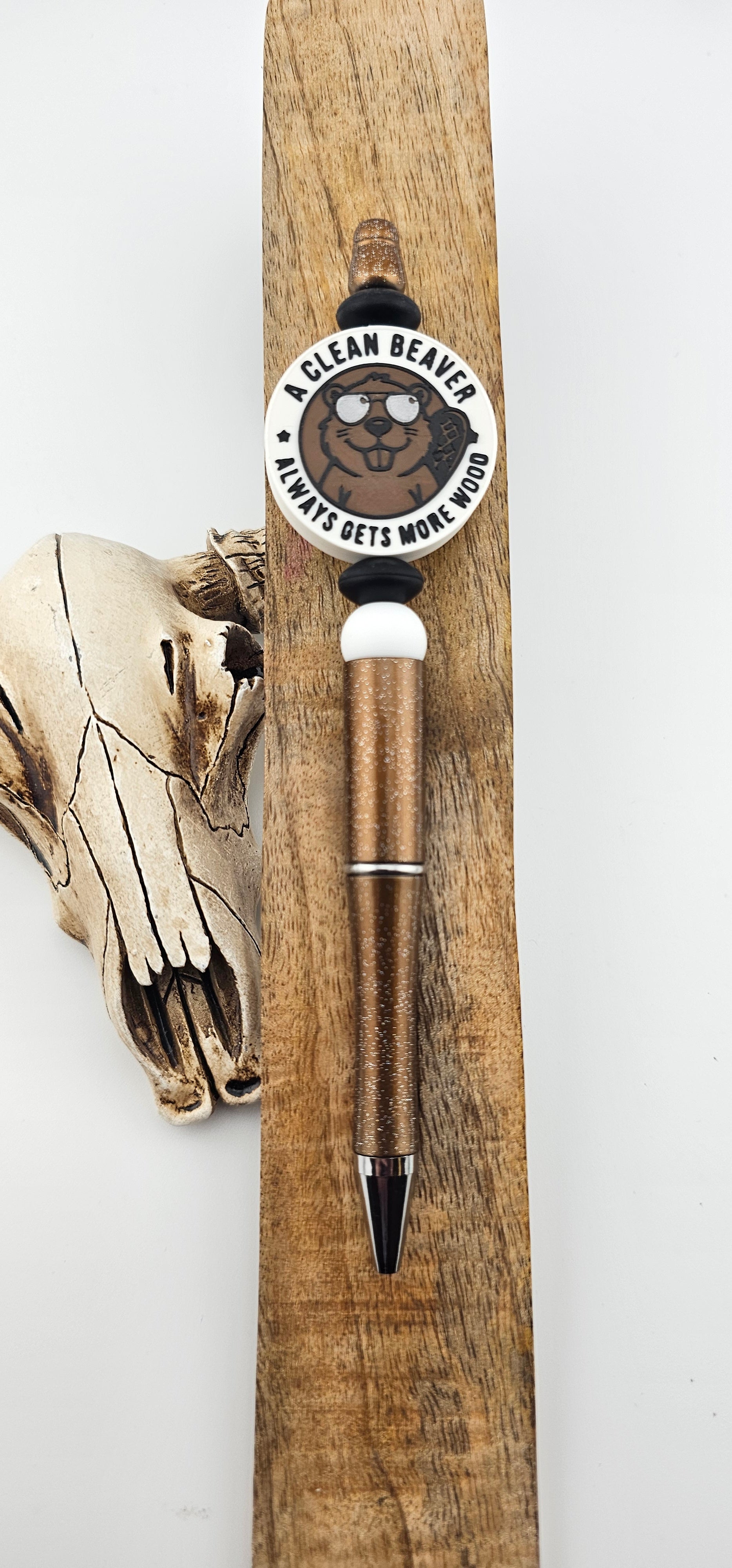 A Clean Beaver Gets More Wood *not silicone* printed by a 3D printer